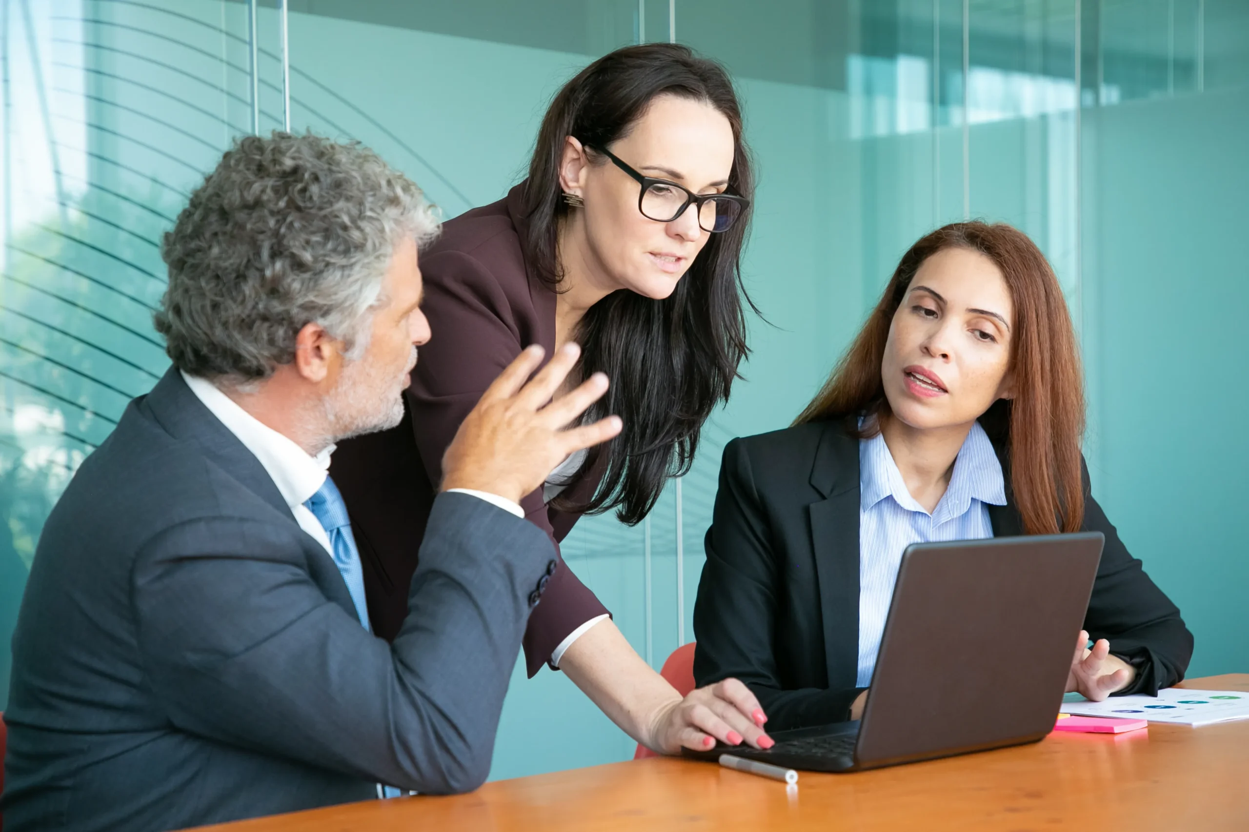 business-partners-watching-presentation-discussing-project-meeting